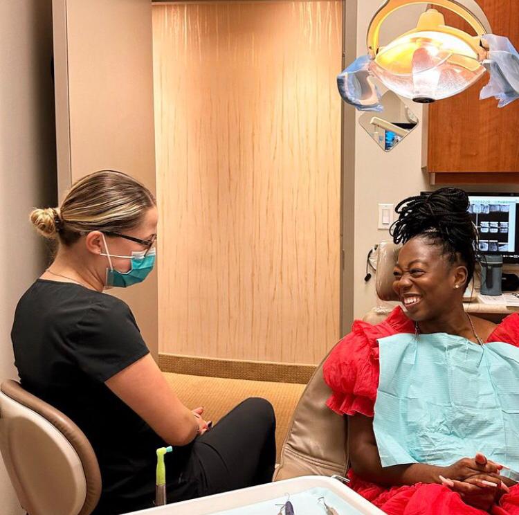 Patient receiving a consultation for dental crowns NYC.