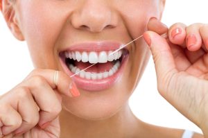 Flossing Your Teeth for Healthy Teeth