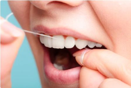 Flossing your teeth helps maintain healthy gums and prevent cavities.